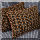 D065. Pair of pillows with square pattern. 